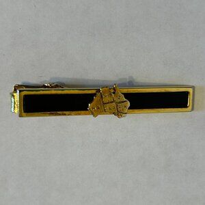 Vintage black and gold coloured tie clip with Australia map with states marked
